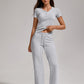 Women's Casual Sports Two-piece Set With V-neck Button, Short Sleeved, Low Waisted Flared Pants, Sportswear